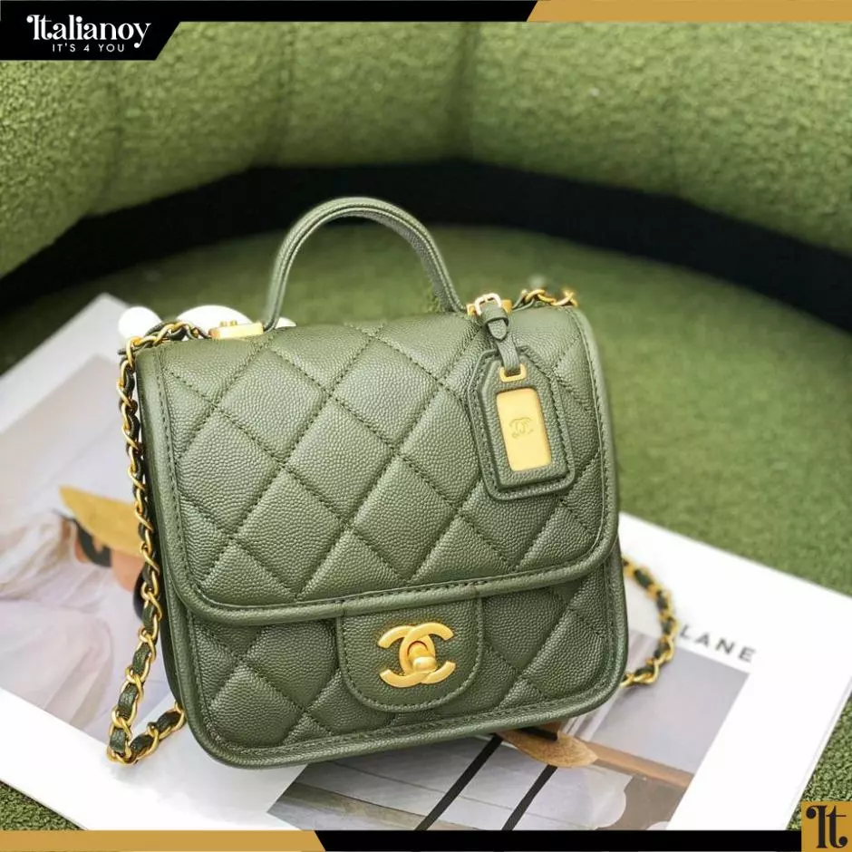 SMALL FOLD-OVER BAG WITH A TOP HANDLE