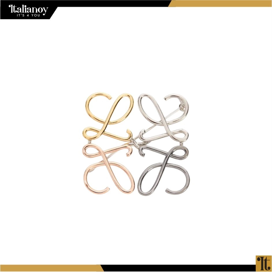 Anagram brooch in metal